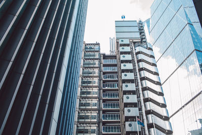 Low angle view of modern buildings against sky