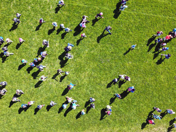 High angle view of people on field