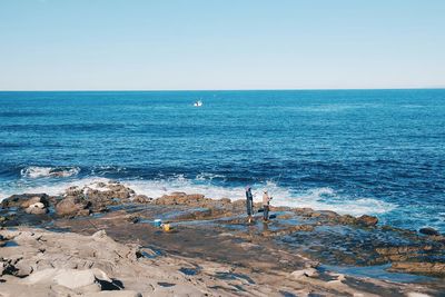 Scenic view of sea against clear sky