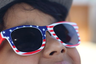 Close-up portrait of boy wearing sunglasses