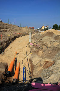 Panoramic view of construction site against clear blue sky