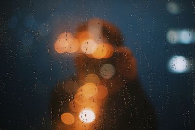 Close-up of raindrops on glass window