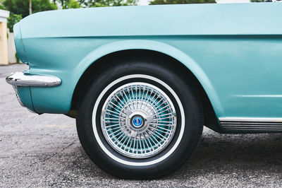 Horizontal shot of the front part of a classic old car