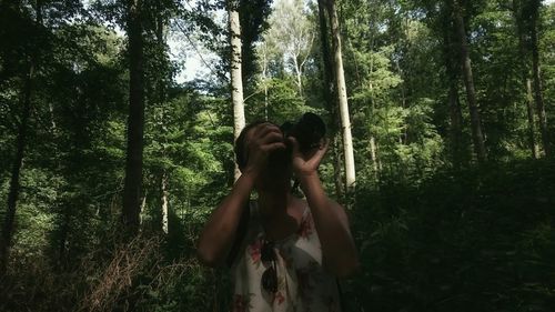 Young woman in forest