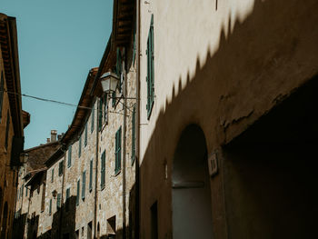 Low angle view of old building against clear sky