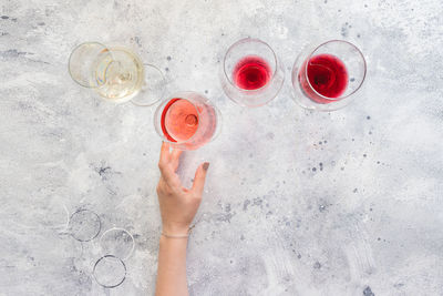 High angle view of woman holding drink