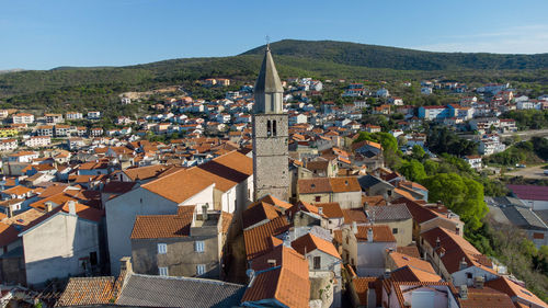 Vrbnik on island krk from above with church tower against the sky