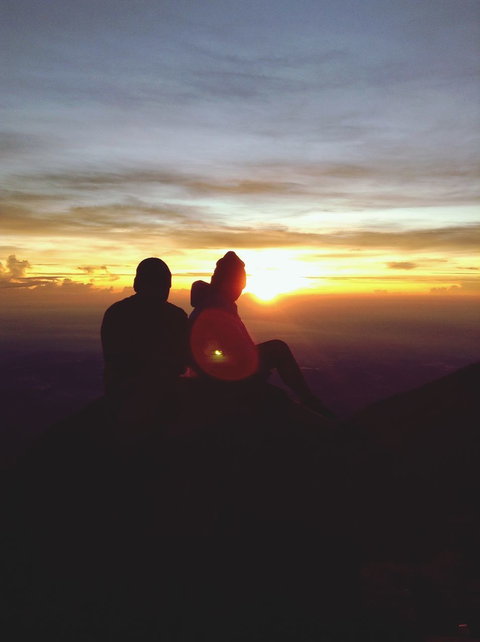 sunset, sky, silhouette, orange color, men, cloud - sky, scenics, beauty in nature, lifestyles, leisure activity, tranquility, nature, tranquil scene, sun, idyllic, togetherness, cloud