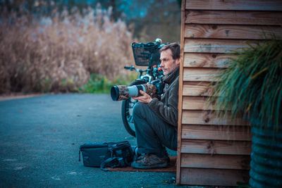 Man photographing with camera