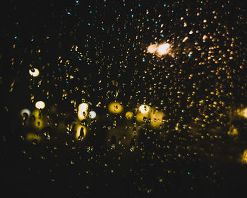 Full frame shot of wet glass window