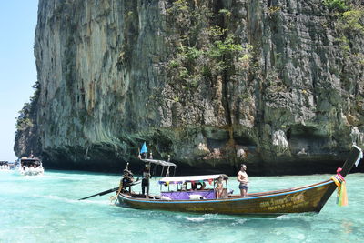 People on boat in sea