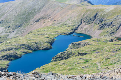 High angle view of lake and rocks