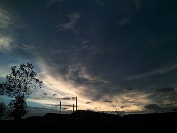Low angle view of dramatic sky at sunset