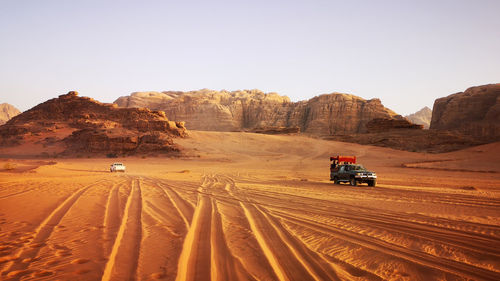 Scenic view of desert against clear sky