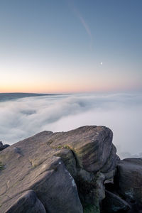 Scenic view of sea against sky at sunset