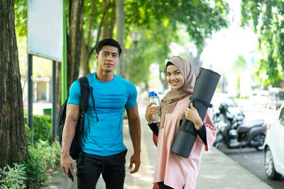 Young couple on street in city