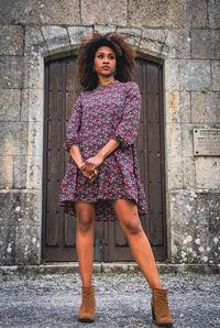 Woman in front of the door