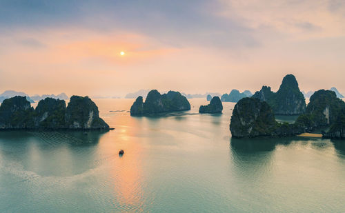 Scenic view of sea against sky during sunset