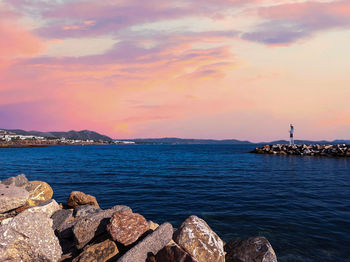 Scenic view of sea against sky during sunset