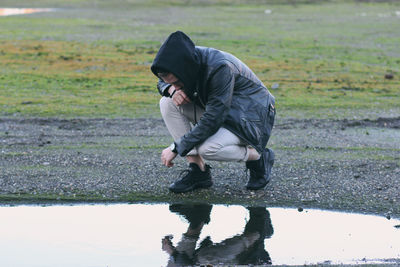 Woman standing on field