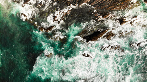 Full frame shot of rocks in sea