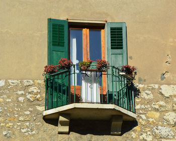 Low angle view of house window