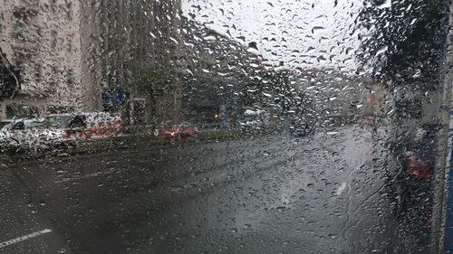 Full frame shot of wet window in rainy season