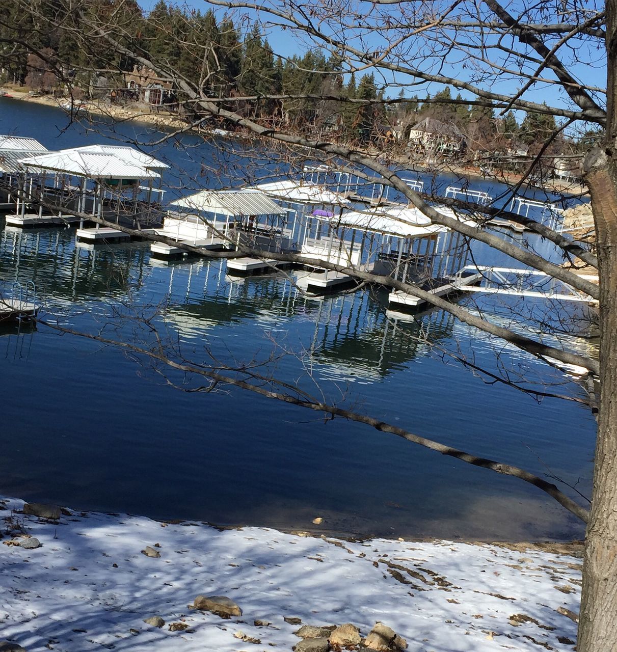 water, snow, cold temperature, winter, bare tree, nautical vessel, lake, tree, moored, nature, frozen, river, transportation, tranquility, boat, sky, reflection, day, ice, tranquil scene