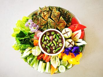 High angle view of chopped vegetables in bowl on table