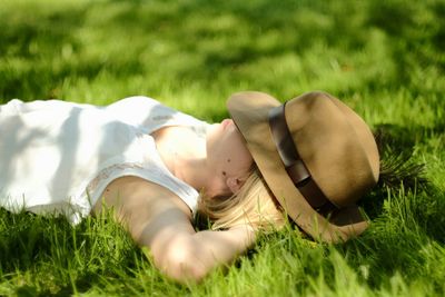 Girl lying on grass