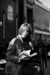 Woman holding book