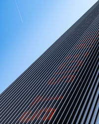 Low angle view of building against clear blue sky