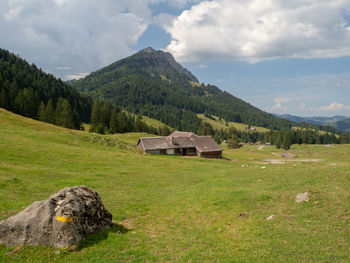 Built structure on land against sky