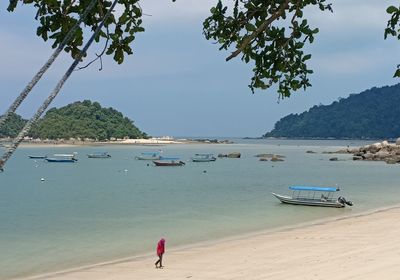 Scenic view of beach against sky