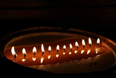 Close-up of burning candles