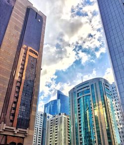 Low angle view of modern buildings against sky