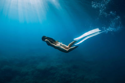 Man swimming in sea