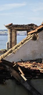 Bridge over sea against sky