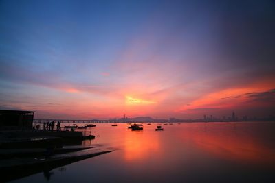 Scenic view of calm sea at sunset