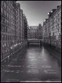 View of canal in city