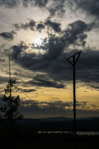 Low angle view of silhouette tree against sky during sunset