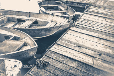 High angle view of abandoned boat moored at shore