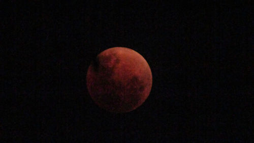 Scenic view of moon against sky at night