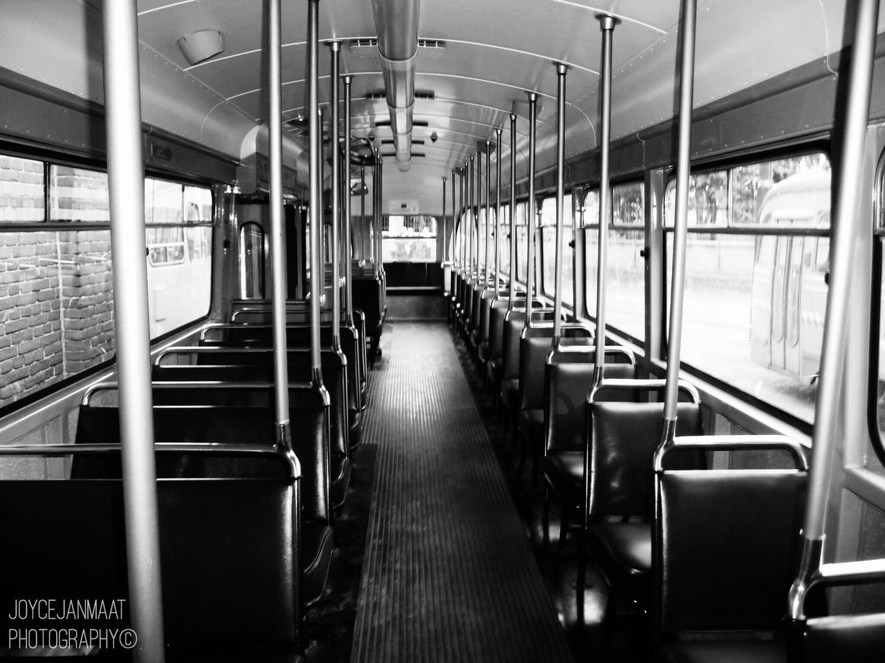 window, vehicle interior, indoors, transportation, empty, public transportation, seat, public transport, in a row, narrow, long, diminishing perspective, modern, interior, train interior, the way forward