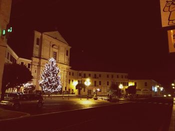 Illuminated christmas tree at night