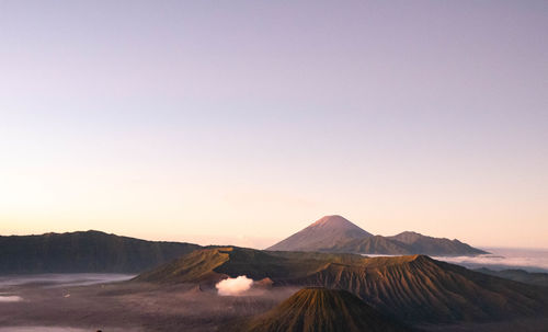 Scenic view of mountains against sky during sunset
