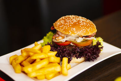 Close-up of burger in plate on table