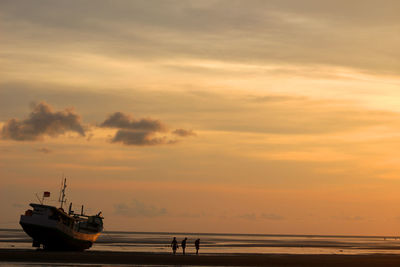 Enjoy sunset with friends at lampu satu beach