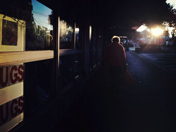 Silhouette of woman in sunlight