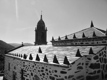 San andres de teixido church against sky on sunny day